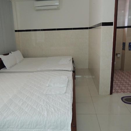 Hung Hieu Hotel Mỹ Tho Chambre photo