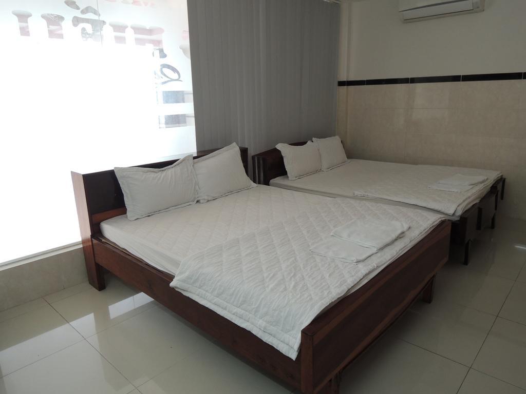 Hung Hieu Hotel Mỹ Tho Chambre photo