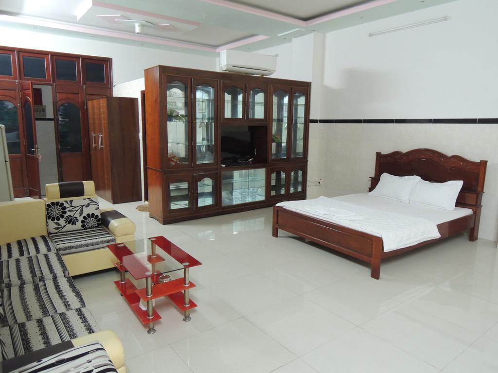 Hung Hieu Hotel Mỹ Tho Chambre photo