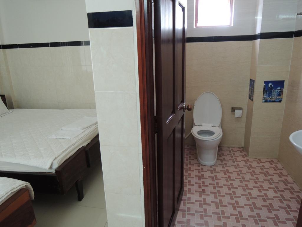 Hung Hieu Hotel Mỹ Tho Chambre photo